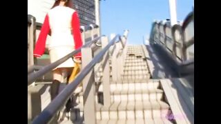 Hot girl with a yellow bag skirt sharked on the stairs